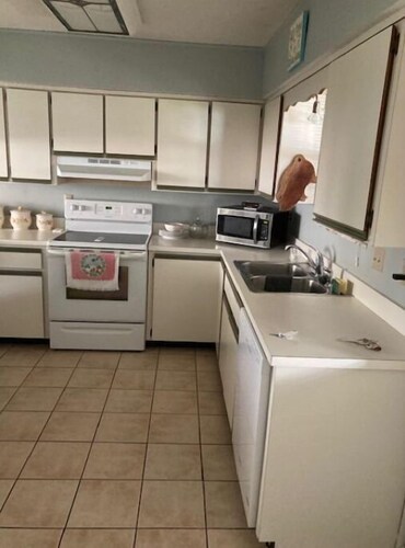 Peaceful Beach with Outdoor Porch Living in Great Neighborhood