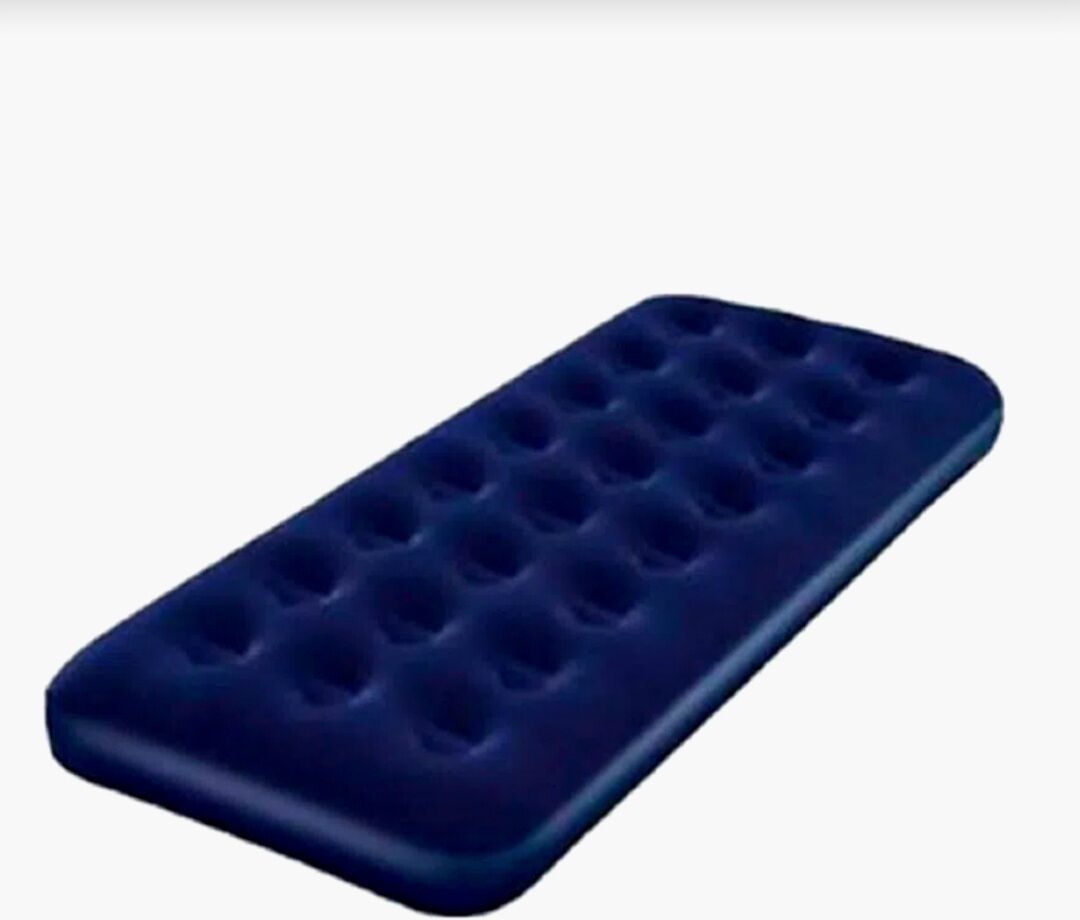 A blue rectangular object with multiple circular indentations.
