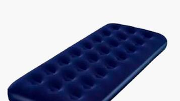 A blue rectangular object with multiple circular indentations.
