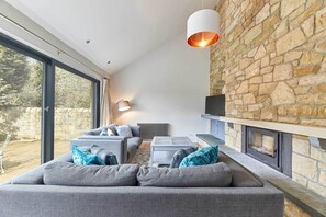 Casa | Área de sala de estar | Televisión de pantalla plana 