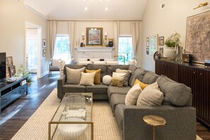 Smart TV, fireplace, books, offices