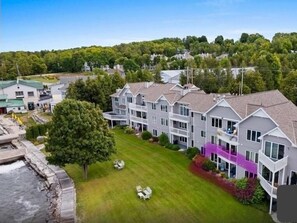 Exterior - Cozy Sister Bay Waterfront condo 
2BR/2BA 
Ground level porch, lawn, pier, bay (Sister Bay)