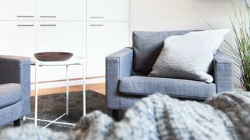 City Condo | Living area | Smart TV