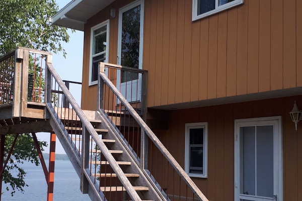 Door to 2 bedroom is to the right of the stairs. 3 bedroom suite is upstairs.