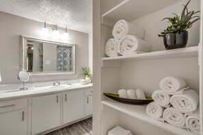 Bathtub, hair dryer, towels