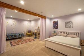 A bedroom with a bed, a desk, a chair, and a bookshelf. - Eye On The Gorge - Perched On The Edge Of The Gorge, Private Hot Tub, A/C, Updated and Epic (White Salmon)