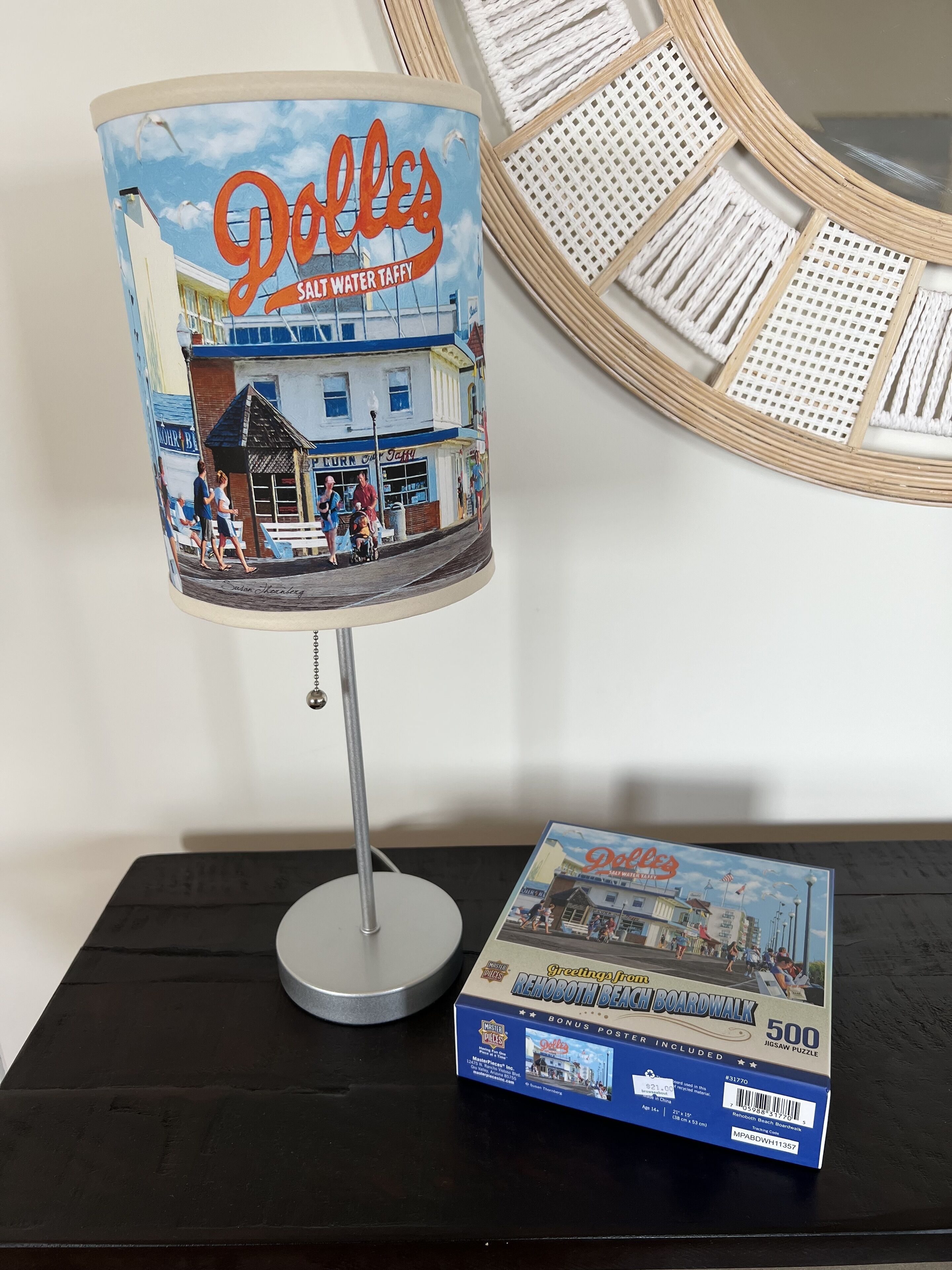 A saltwater taffy stand with a jigsaw puzzle of Rehoboth Beach Boardwalk.
