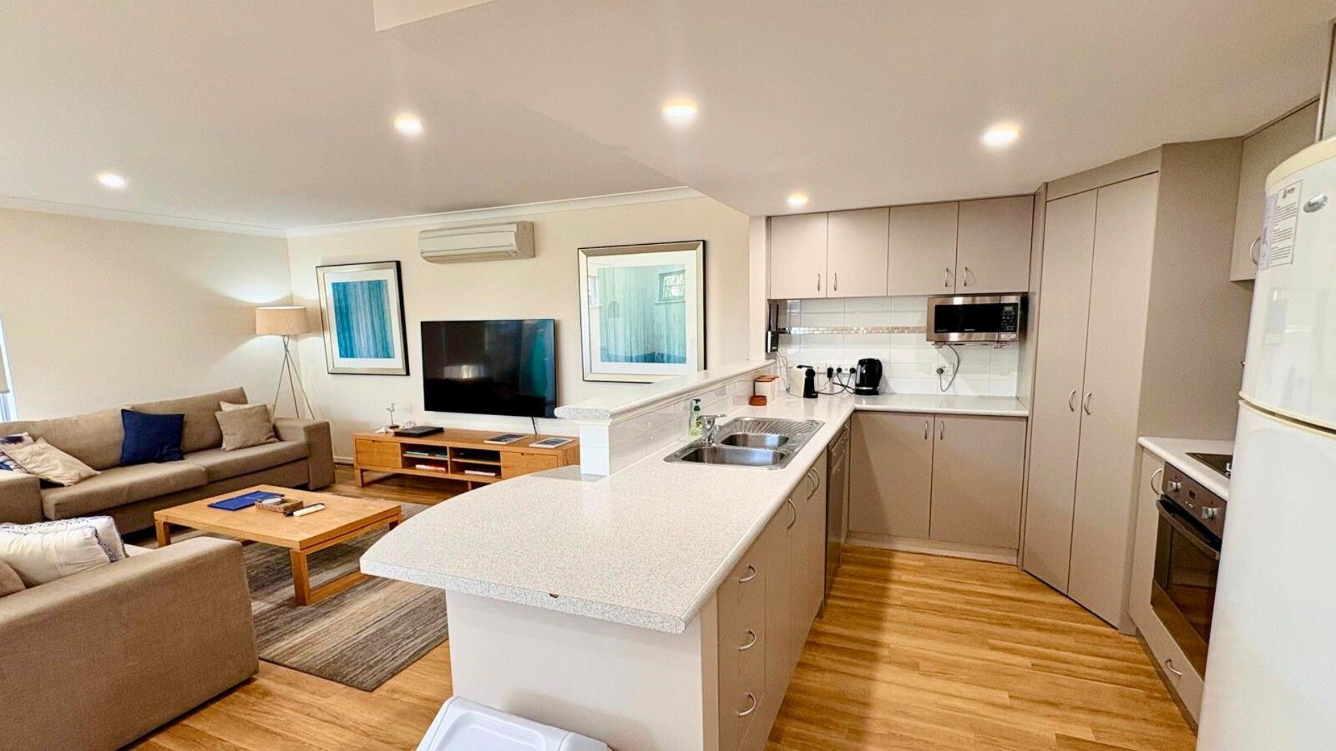 Microwave, oven, dishwasher, dining tables