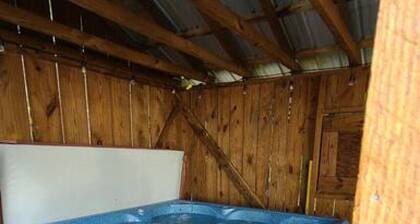 Farm House stay with soaking tub and hot tub barn