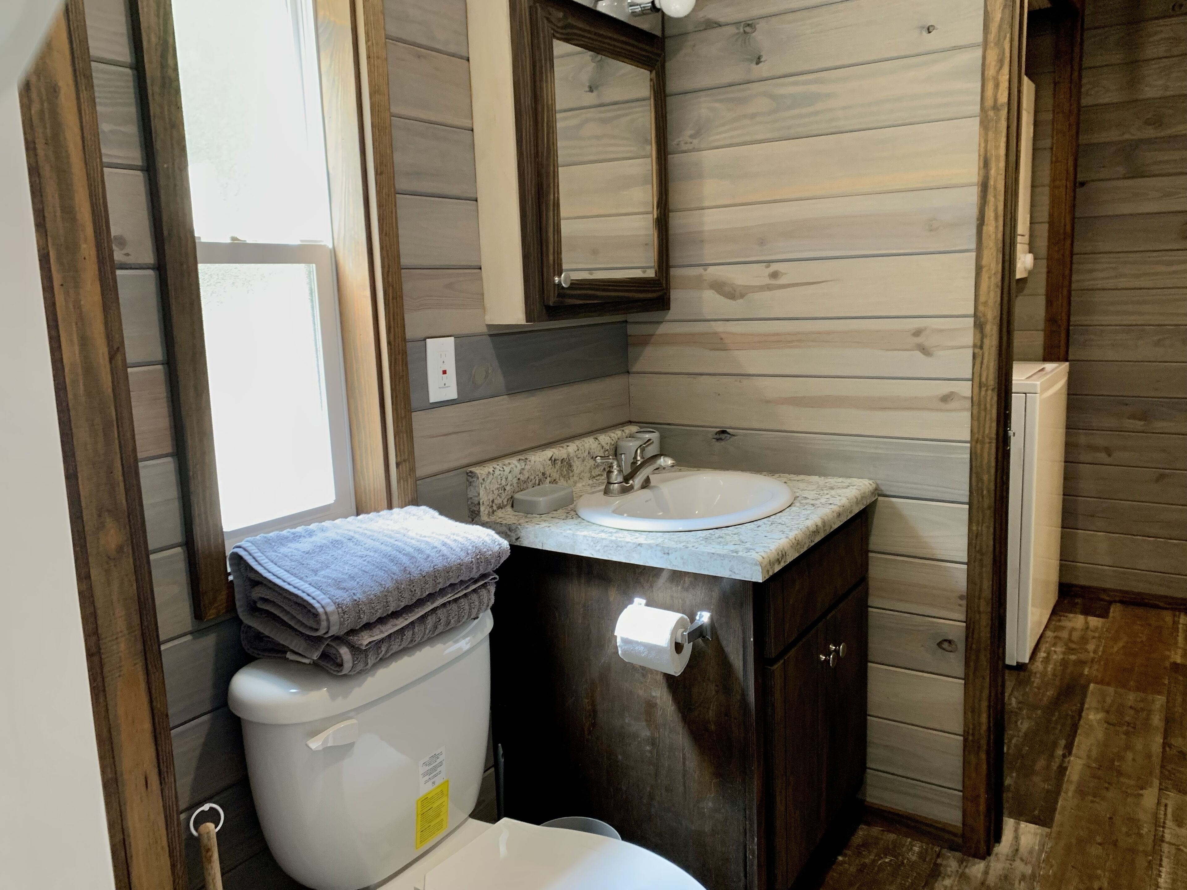 Shower, towels, soap, toilet paper