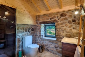 Shower, towels, soap, toilet paper