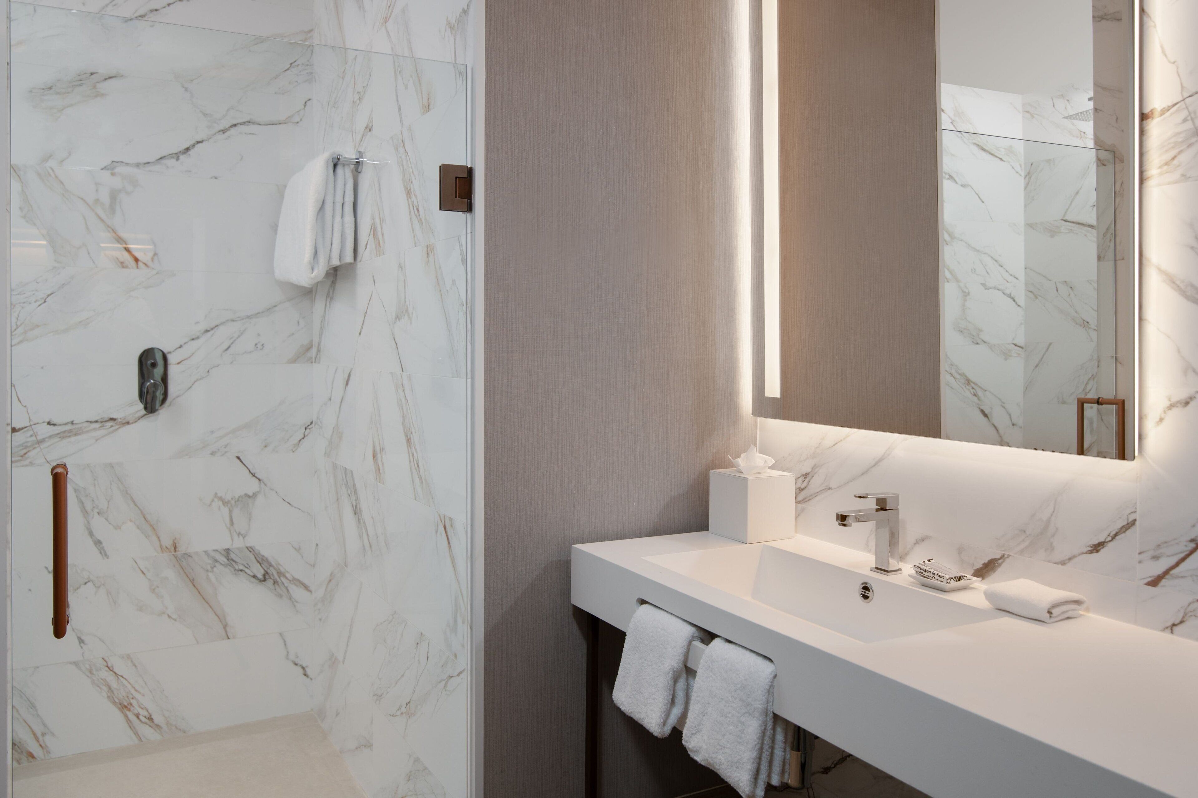 premium bedding, down duvets, in-room safe, desk