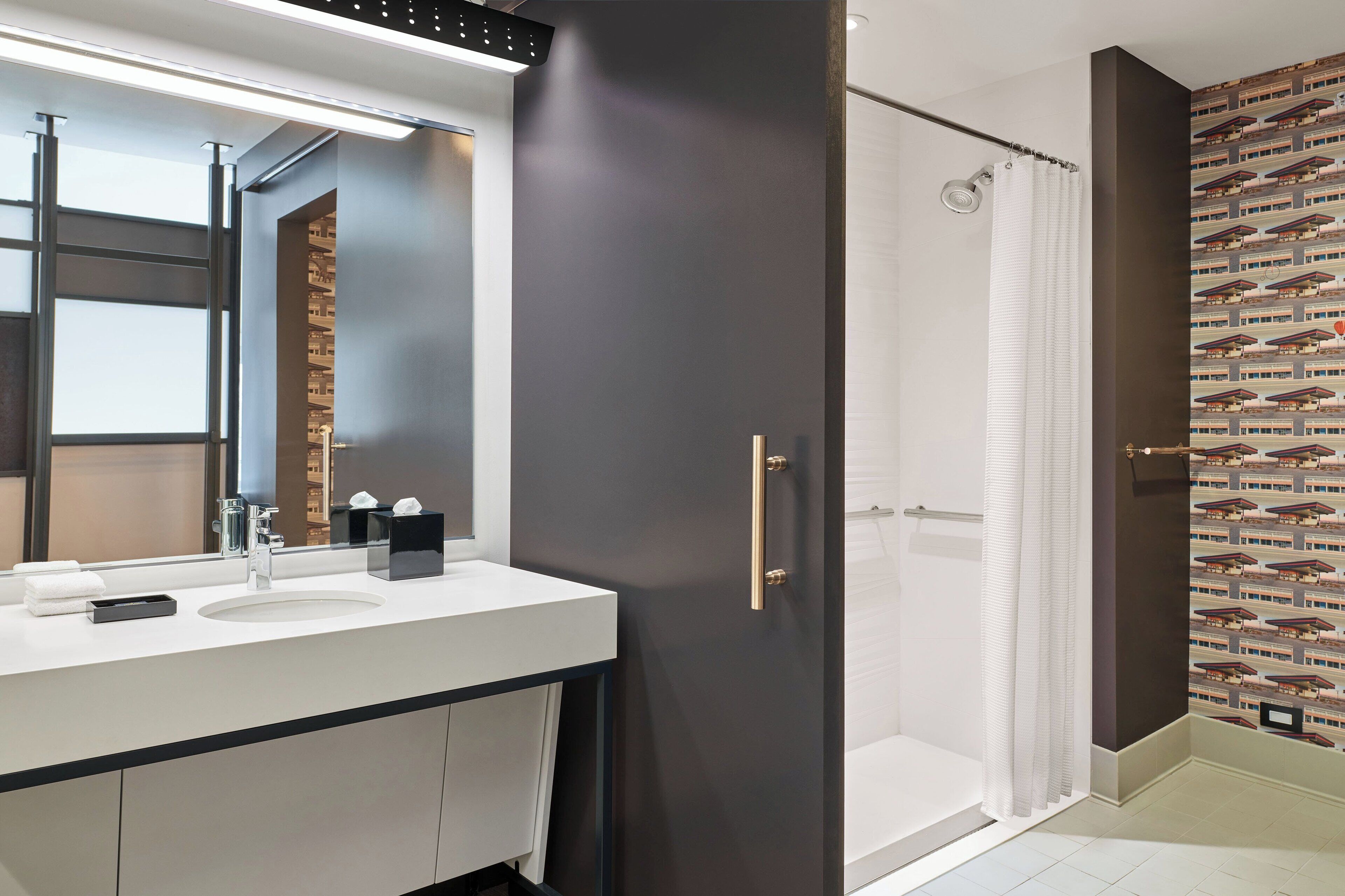 shower, free toiletries, hair dryer, towels