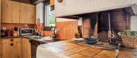 Fridge, dishwasher, highchair, cookware/dishes/utensils