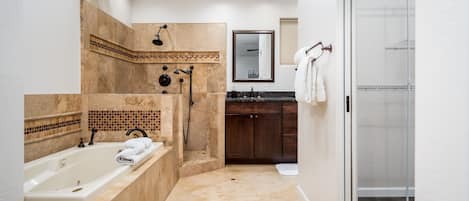 Combined shower/bathtub, hair dryer, towels, soap