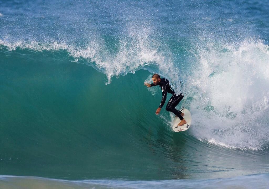 A surfer riding a wave.
