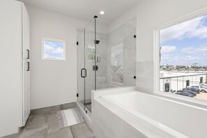 Combined shower/tub, jetted tub, hair dryer, soap