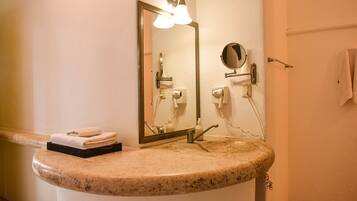 Shower, hair dryer, towels, shampoo