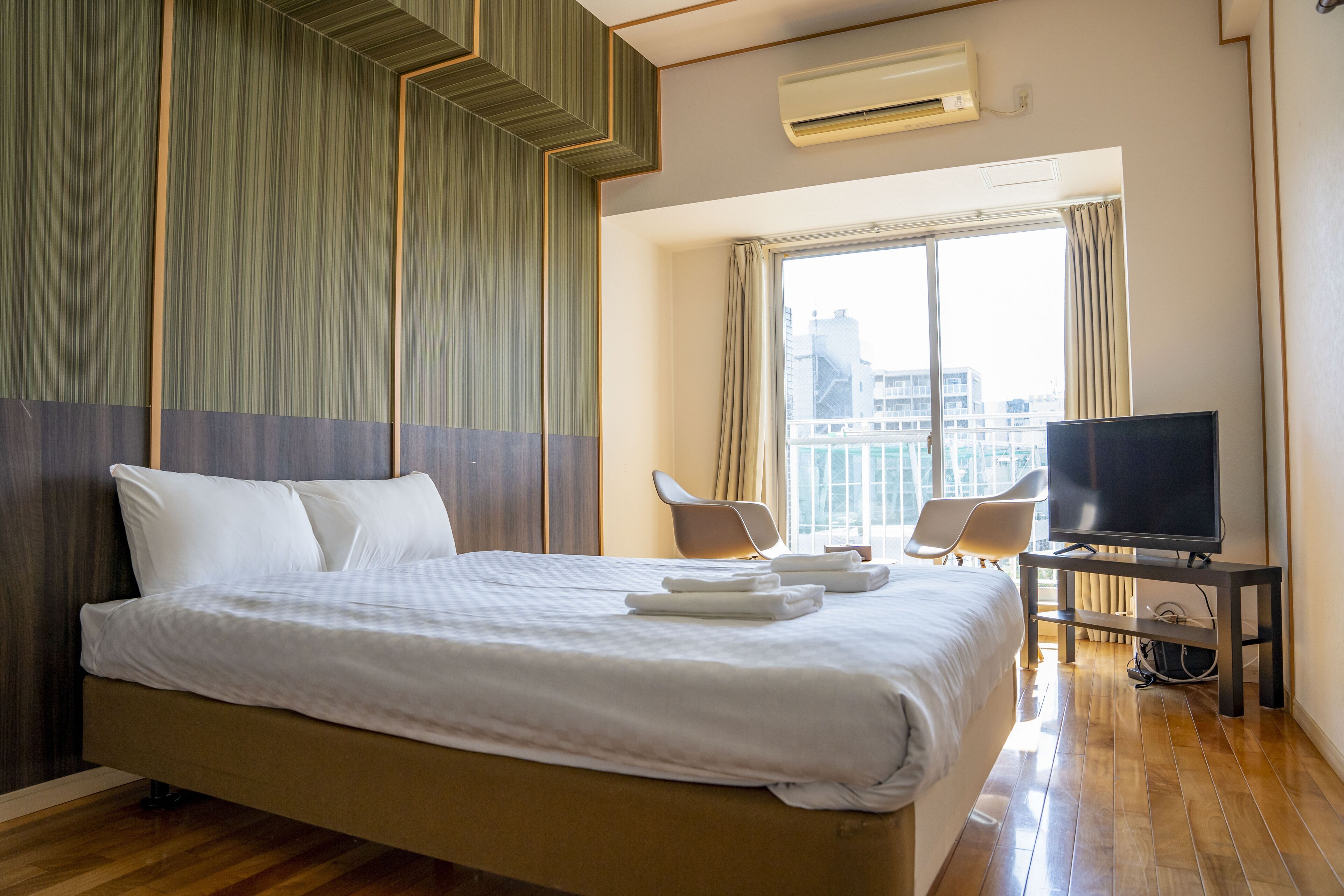 ダブルルーム  禁煙 | 1 室のベッドルーム、デスク、ノートパソコン用作業スペース、防音設備