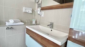 Hair dryer, towels, toilet paper