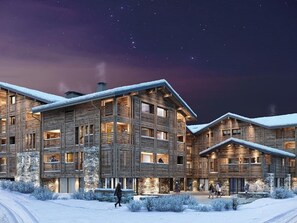 A modern log cabin hotel with multiple levels, large windows, and a snow-covered landscape. - Luxury Apartment in Central Les Gets with Parking and Balcony (Les Gets)