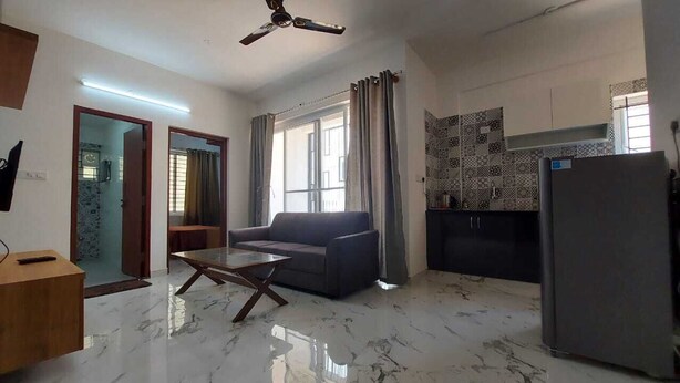 Apartamento Deluxe | Zona de estar