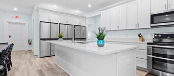SLEEP UP TO 32! 1 Block to MAIN ST, WALK to the Beach+ATTRACTIONS Private Pool!!