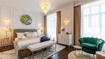 1 habitación, tabla de planchar con plancha y cuna de viaje