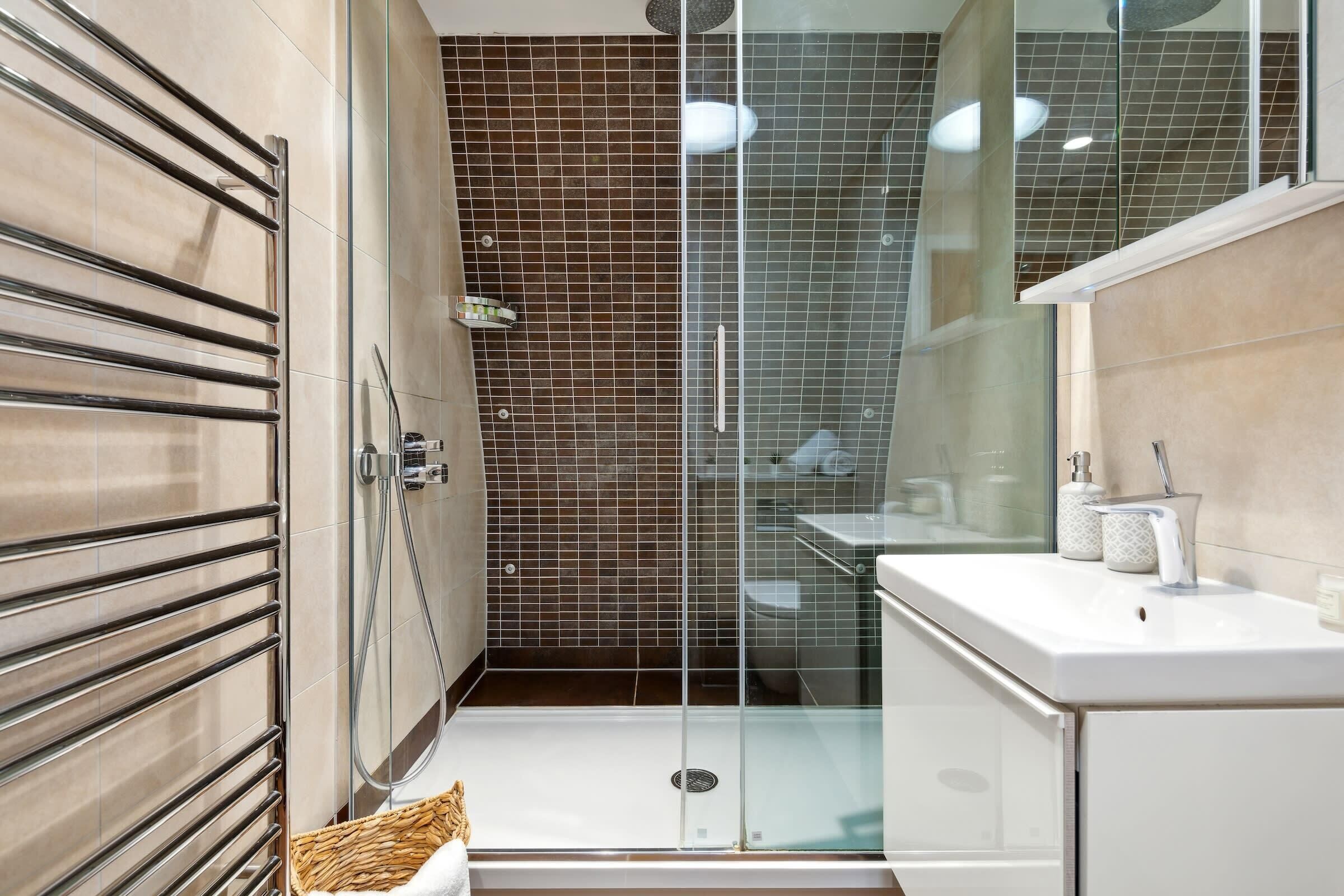 Bathtub, hair dryer, towels, soap