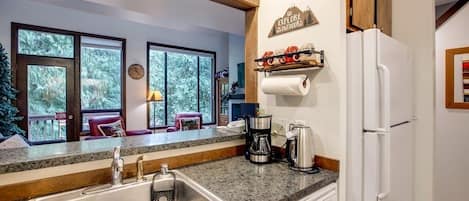Condo, 2 Bedrooms | Private kitchen | Fridge, oven, dishwasher, coffee/tea maker