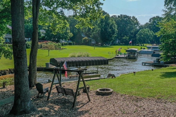 Amazing Lakefront flat backyard with multiple spots to entertain