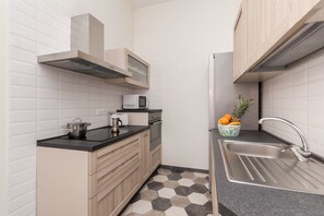Apartemen | Dapur pribadi | Lemari es, microwave, oven, dan kompor