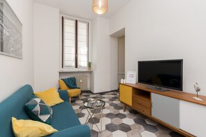 Apartemen | Area keluarga | Televisi layar datar 24-inci dengan saluran TV kabel dan TV