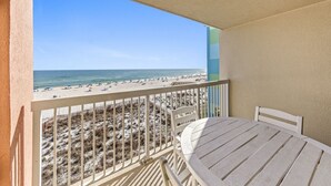 A balcony with a view of a beach and ocean. - Harbour Place 313 (Orange Beach)
