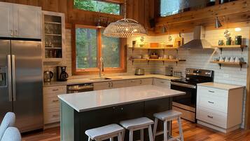 Coffee/tea maker, fridge, microwave, oven