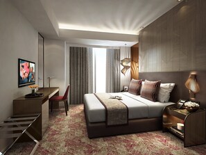 Ropa de cama de alta calidad y caja de seguridad en la habitación