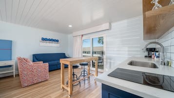 Studio Suite, 1 King Bed with Sofa bed, Resort View | Laptop workspace, iron/ironing board, free WiFi, bed sheets