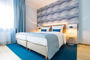 Premium bedding, in-room safe, desk, soundproofing