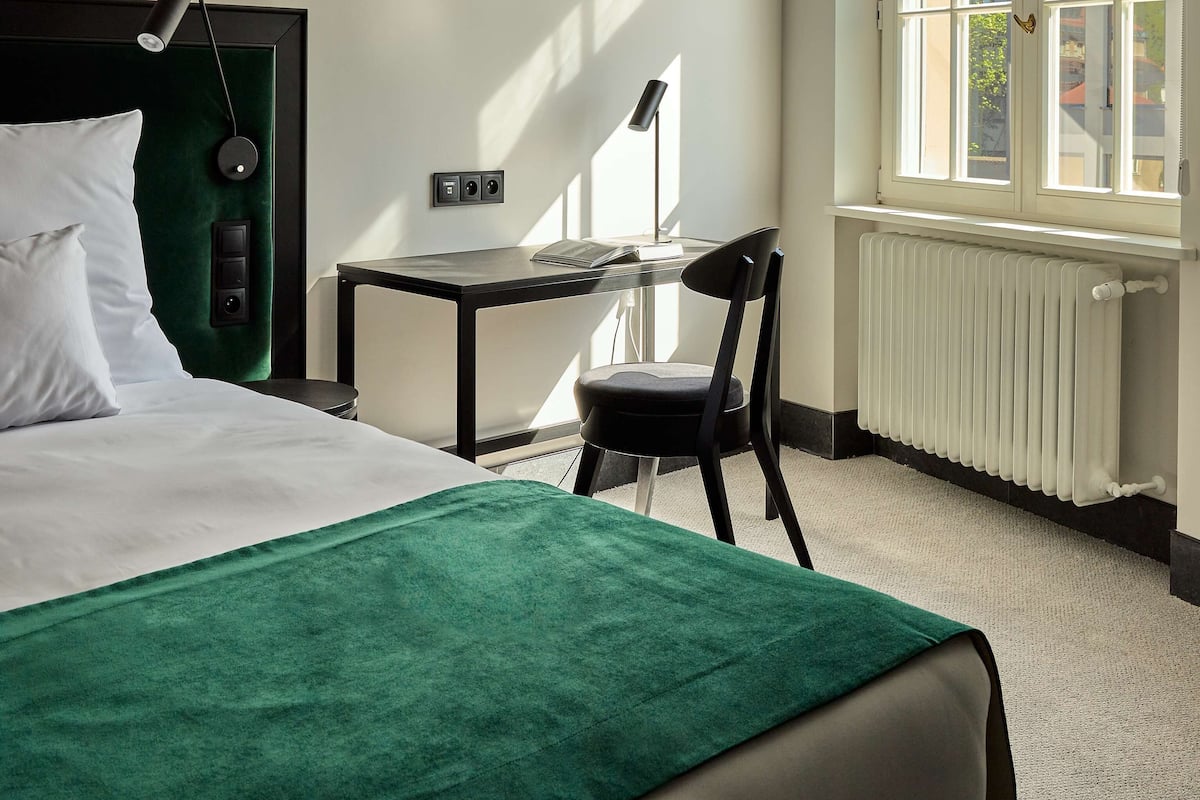 Suite, 1 King Bed, Non Smoking (Small Room;with Sofabed) | 1 bedroom, in-room safe, desk, laptop workspace