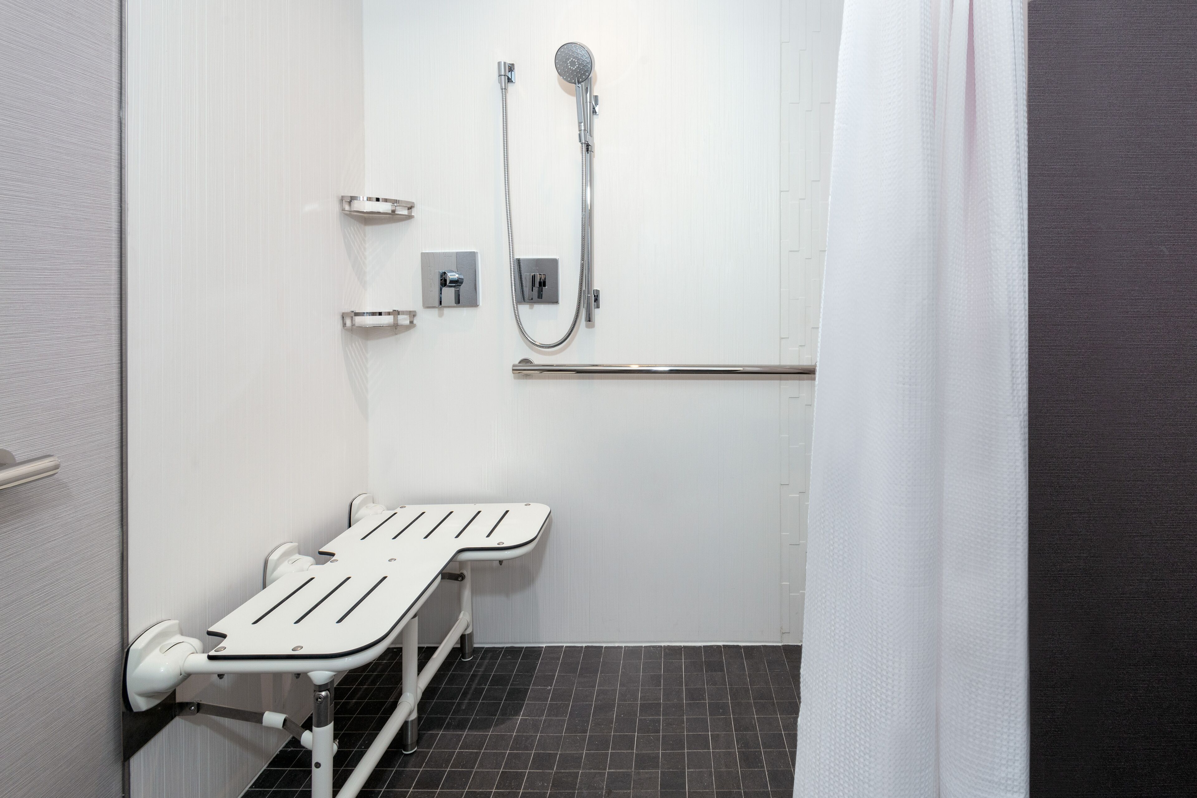 Suite, 1 Bedroom (Mobility Accessible, Roll-In Shower) | Bathroom | Free toiletries, hair dryer, towels, soap
