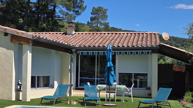 A poolside area with a tiled roof, a covered patio, and a pool. - Self-contained, air-conditioned studio, swimming pool just for you, rated 2*. (Ucel)