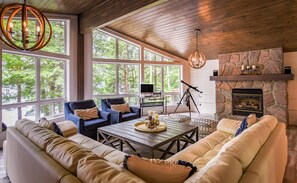 Smart TV, fireplace, table football, books