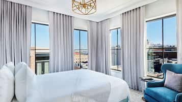 Room, 1 King Bed, Corner | In-room safe, iron/ironing board, free WiFi, bed sheets