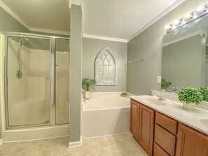 Combined shower/tub, hair dryer, towels, soap