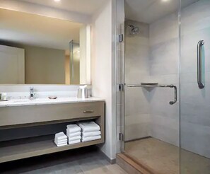 Shower, hair dryer, towels, toilet paper