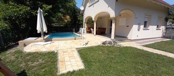 Holiday home with pool and garden shower