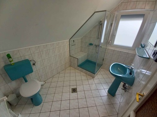 Holiday home with pool and garden shower