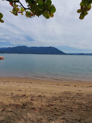On the beach, sun loungers, beach towels