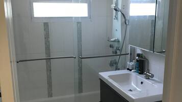Shower, hair dryer, towels