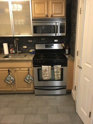 Fridge, microwave, oven, stovetop - Oceanview Apt - Steps to the Beach! (Long Beach)
